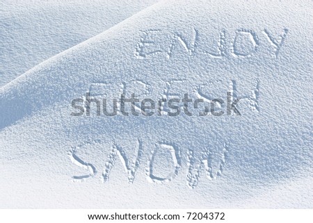 Enjoy Fresh Snow writing text on sunny day