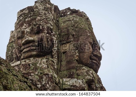 The Faces of Bayon Temple at Angkor/ Stone Faces/ The Faces look down on Bayon Temple at Angkor Park, Cambodia.