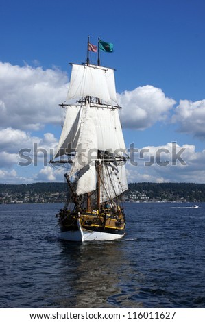 KIRKLAND, WASHINGTON - AUG 31 - The wooden brig, Lady Washington, sails on Lake Washington    during a mock sea battle as part of Labor Day festivities on Aug 31, 2012 near Kirkland , Washington.