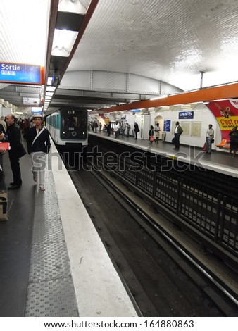 PARIS - SEP 14 - Passengers await the arrival of a train   on Sep 14, 2011, in Paris, France