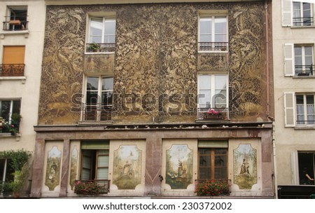 PARIS - OCT 4, 2011 - Renaissance frescoes decorate the building on the Rue Mouffetard, Paris, France