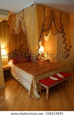 ISTANBUL, TURKEY - MAY 17, 2014 -Canopied bed in Hotel Albatross,  in Istanbul, Turkey
