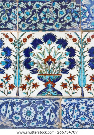 ISTANBUL - MAY 18, 2014 -   Iznik lapis  tiles with tulip pattern on a wall  Courtyard of the Favorites Harem of  Topkapi Palace, in Istanbul, Turkey