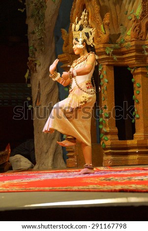 SIEM REAP, CAMBODIA - FEB 14, 2015 - Solo Apsara dancer uses hand gestures to tell a story,  Siem Reap,  Cambodia