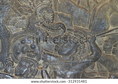 Detail of battle of devas and asuras,  bas relief  North Gallery, west wing Angkor Wat,  Cambodia
