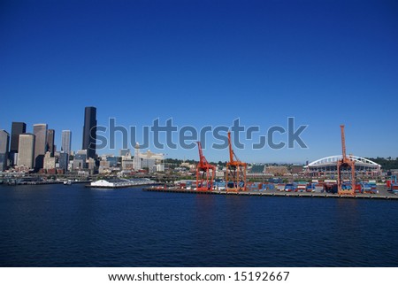 Seattle waterfront skyline,with ferry and dockyard cranes,		Puget Sound, 	Pacific Northwest