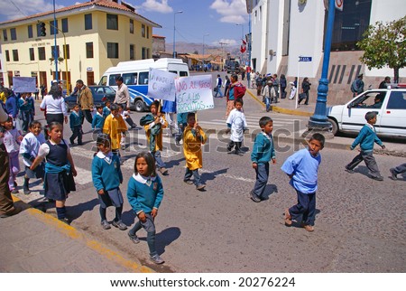 CUSCO PERU 29 AUG 2008 - School kids carrying banners in parade demonstration supporting ecology