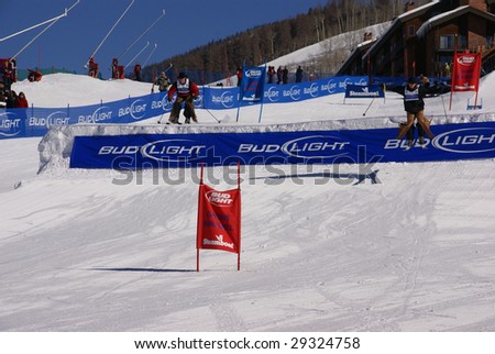 STEAMBOAT SPRINGS, COLORADO - JAN 20 :  Cowboys in chaps and stetson hit the jump at Cowboy Downhill, Rocky Mountains January 20, 2009 in Steamboat Springs, Colorado.