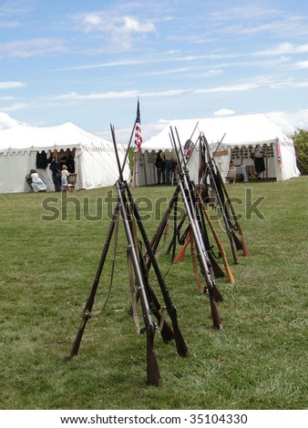 Union army rifles, stacked in camp,  Civil War Battle Re-enactment,  Port Gamble, WA