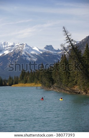 Kayakers on the Bow River,  Canadian Rockies, Banff, Alberta, Canada