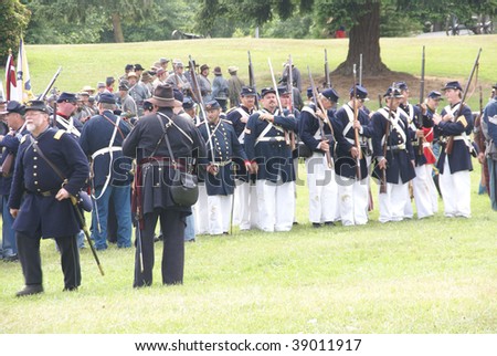 PORT GAMBLE - JUNE 20: Union infantry form a line for review after a mock Civil War battle on June 20, 2009 in Port Gamble, WA.