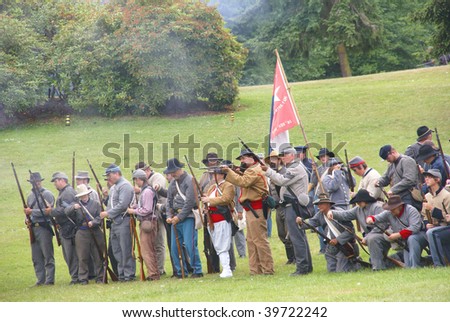 PORT GAMBLE, WA - JUNE 20 : Confederate infantry line fires a volley during a mock Civil War battle on June 20, 2009 in Port Gamble, WA.
