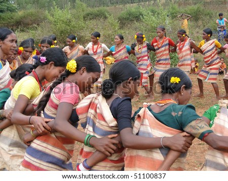 ORISSA,  INDIA - NOV 12 - Village women link arms for  Gdaba harvest dance  on Nov 12, 2009, in Lamptaput, Orissa, India