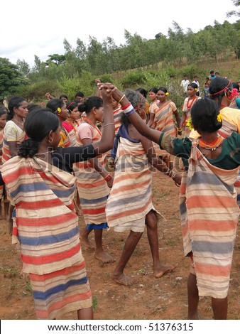 ORISSA,  INDIA - Nov 12 - Village women link arms for  Gdaba harvest dance  on Nov 12, 2009, in Lamptaput, Orissa, India