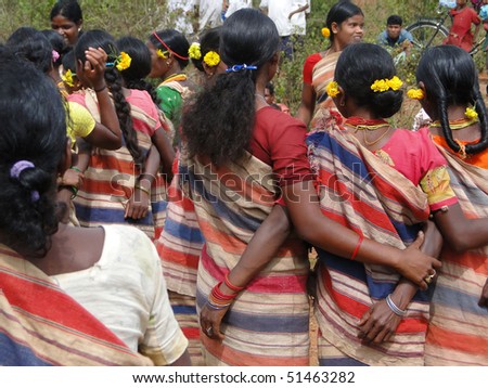 ORISSA,  INDIA - Nov 12 - Village women link arms for  Gdaba harvest dance  on Nov 12, 2009, in Lamptaput, Orissa, India