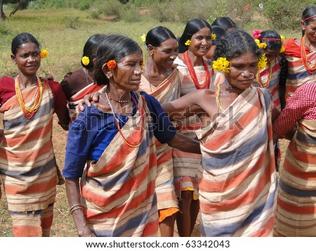 ORISSA,  INDIA - NOV 12 - Tribal women link arms for Gdaba harvest dance on Nov 12, 2009, in Lamptaput, Orissa, India