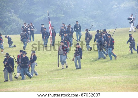 PORT GAMBLE, WA - JUN 20  -  Union infantry maneuvers during a mock Civil War battle on Jun 20, 2009in Port Gamble WA.