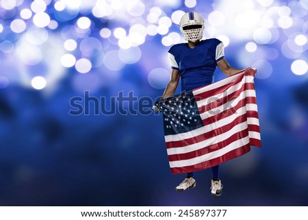 Football Player with a blue uniform and a american flag, on a blue lights background.