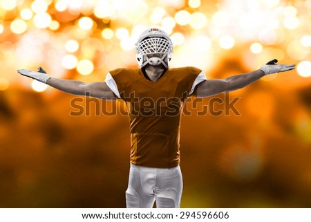 Football Player with a orange uniform celebrating, on a orange lights background.