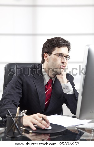 frustrated businessman in front of the computer.