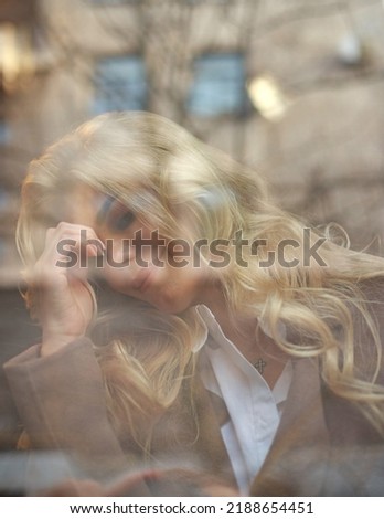 Similar – Image, Stock Photo Woman behind window in building near trees