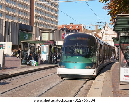 STRASBOURG, FRANCE - SEP 24: A street-level tram in Strasbourg, France on September 24, 2013. Strasbourg is the capital and principal city of the Alsace region in north eastern France.