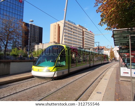 STRASBOURG, FRANCE - SEP 24: A street-level tram in Strasbourg, France on September 24, 2013. Strasbourg is the capital and principal city of the Alsace region in north eastern France.