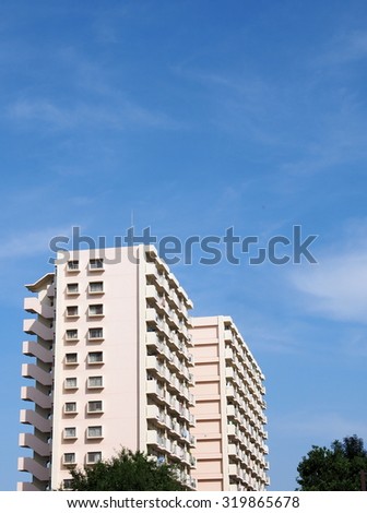 White apartment and blue sky