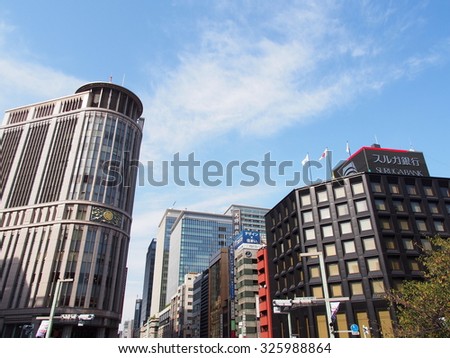 TOKYO, JAPAN - OCT 9: Nihonbashi business district in Tokyo, Japan on October 9, 2015. Tokyo is both the capital and largest city of Japan.