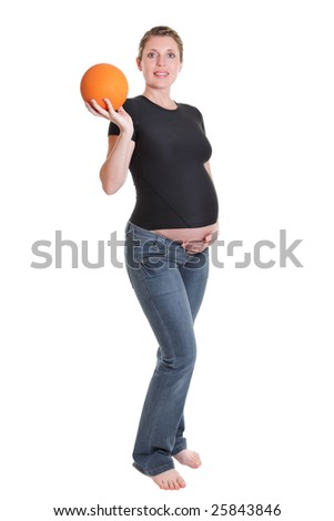 Pregnant woman with medicine ball isolated on the white background.
