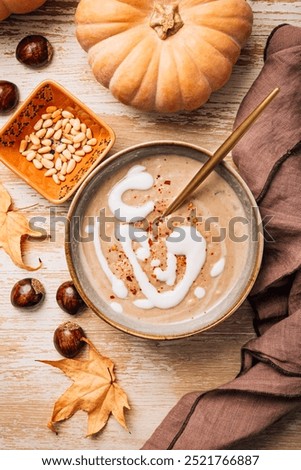 Similar – Image, Stock Photo Tasty pumpkin soup in bowl on table