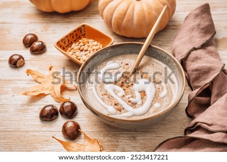 Similar – Image, Stock Photo Tasty pumpkin soup in bowl on table