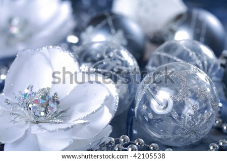 Detail of Christmas balls with flowers in silver tone
