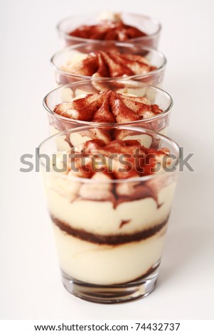 Three Tiramisu desserts in the cup