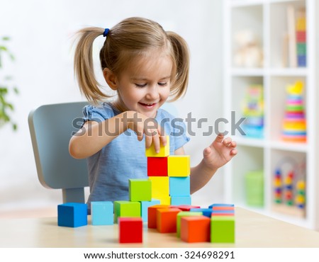 Similar – Image, Stock Photo Small girls building toy construction machine