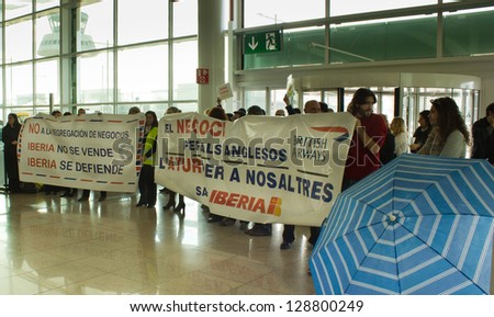 BARCELONA, SPAIN - FEBRUARY 13: Strike of Iberia airline workers in Barcelona airport on February, 2013 in Barcelona. Iberia is the biggest airline in Spain.