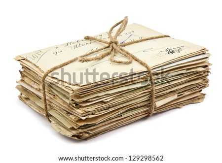 Stack of old letters on white background