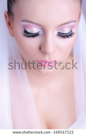 Woman portrait. Professional wedding make-up.