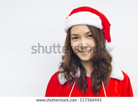 Beautiful young santa clause woman in christmas clothes smiling . isolated on white background