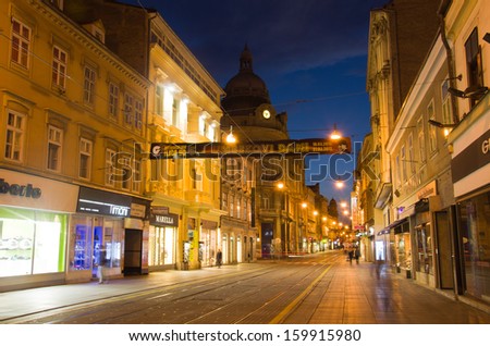 ZAGREB, CROATIA - MARCH 18: People walk at night along Ilica street on March 18, 2012 in Zagreb, Croatia. Ilica is one of the longest and the most expensive residential street in the city.