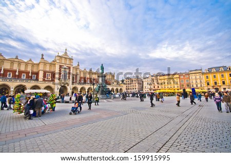 CRACOW, POLAND - MARCH 10: The main market square of the Old Town in Krakow on 10 March 2012. Main square in Krakow is the largest medieval town square in Europe.