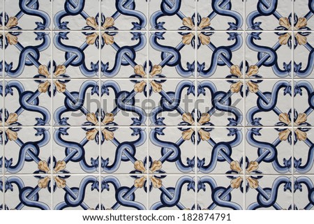 Background of traditional blue, white and gold portuguese tiles
