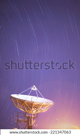 Satellite Antenna under beautiful startrail in blue sky/Satellite Antenna under the startrail