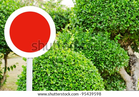 circular red sign in the garden