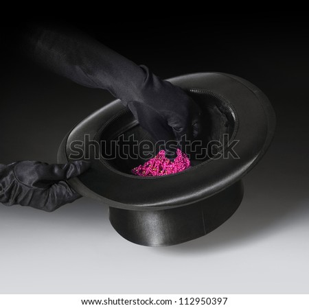 magic scenery with a black top hat and gloved hands in gradient dark back