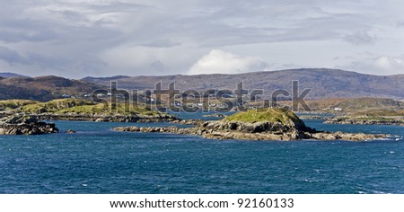 coastal landscape on scottish isle with wetland and hills