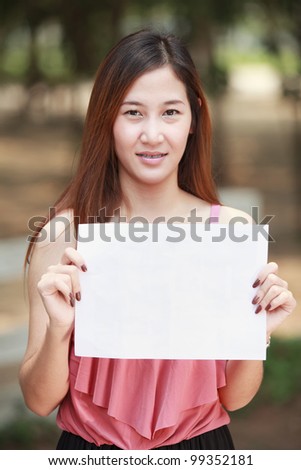 Young long hair Asia women and blank paper for put your text and your job.