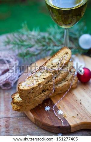 Almond Biscotti with Glass of Wine for Christmas. Also available in horizontal format.