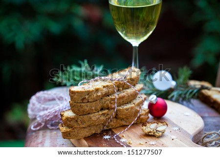 Almond Biscotti with Glass of Wine for Christmas. Also available in vertical format.