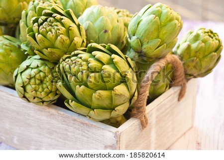 Similar – Image, Stock Photo Boxes with artichokes on farm